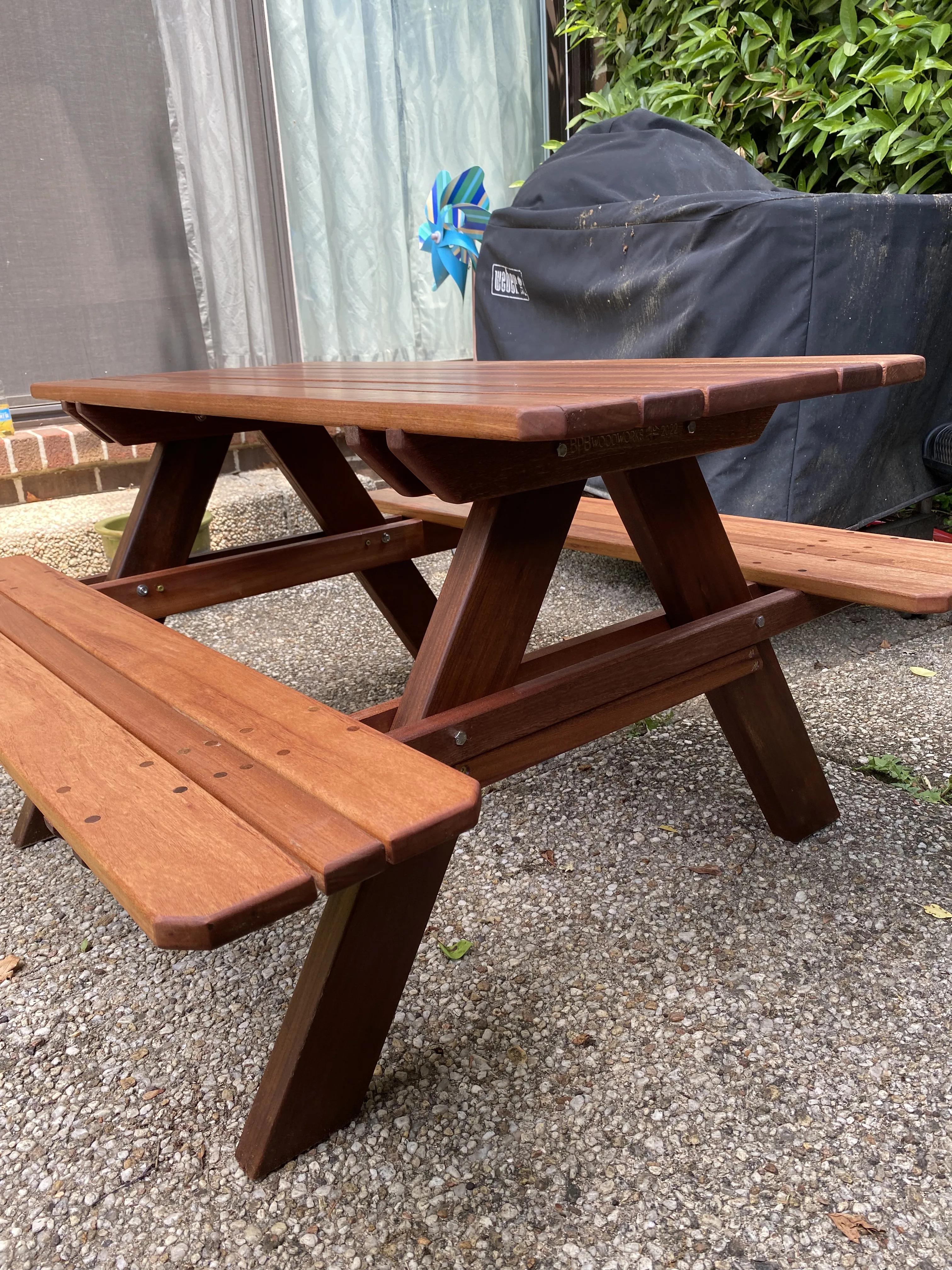 Mahogany picnic table, side view